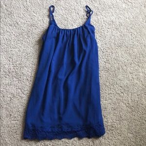 Royal blue dress with lace detailing.